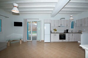 Villa, 3 Bedrooms, Private Pool, Sea View (Erato) | Private kitchen | Full-size fridge, oven, stovetop, espresso maker - Wild View Mykonos (Mykonos)