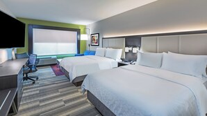 A hotel room with two beds, a desk, a chair, a TV, and a large window. - Holiday Inn Express & Suites Purcell by IHG (Purcell)