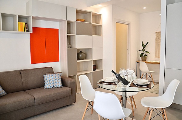 Apartment, 1 Bedroom | Living area | Flat-screen TV