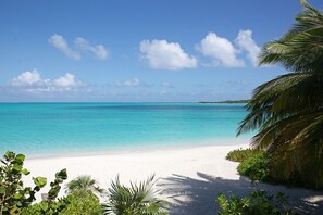 On the beach, sun-loungers, beach towels - Driftwood First Floor Condo at Hoopers Bay With Stunning Views (Georgetown)