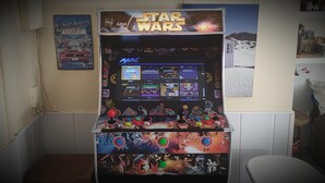 A Star Wars themed arcade machine with multiple game options.