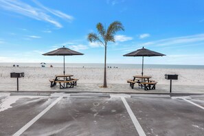 On the beach, sun-loungers, beach umbrellas, beach towels - Newly Renovated Beachfront Condo with Amazing Sunsets from your Balcony! (Treasure Island)