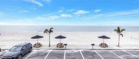 On the beach, sun loungers, beach umbrellas, beach towels