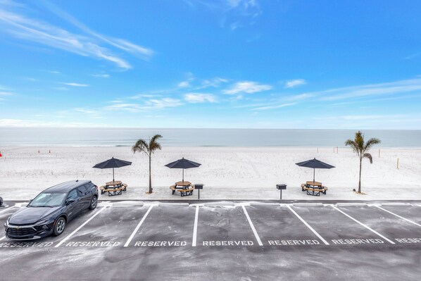 On the beach, sun-loungers, beach umbrellas, beach towels