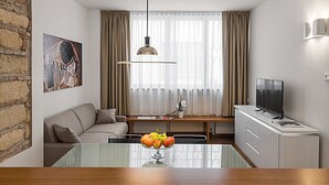 Apartment, 1 Bedroom | Living area | Flat-screen TV - Flats4Rent Casa Sailù (Verona)