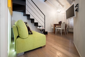 Apartment, 1 Bedroom | Living area | Flat-screen TV