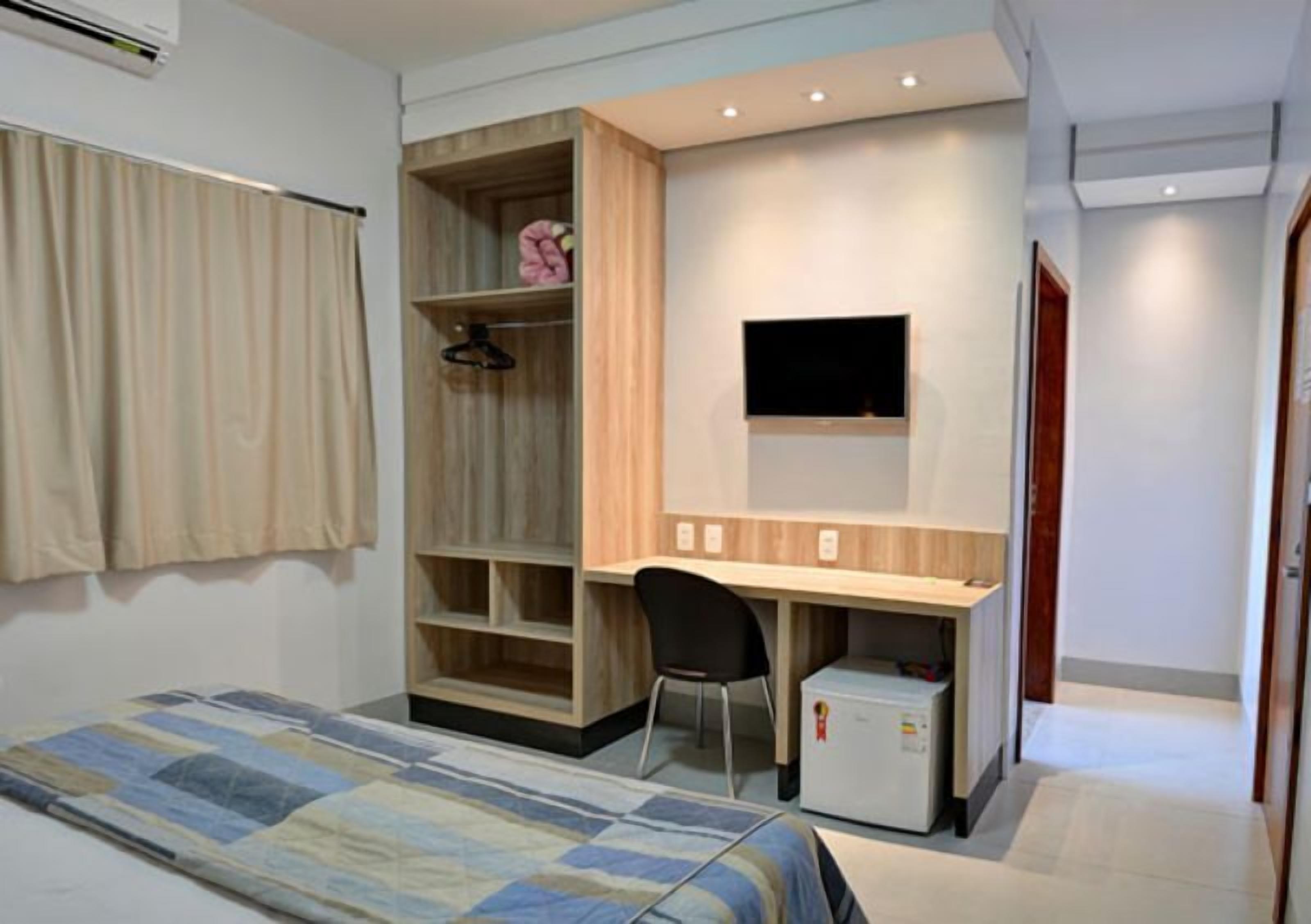 Quarto superluxo | Frigobar, Wi-Fi de cortesia, roupa de cama