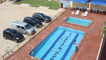 2 outdoor pools, sun loungers