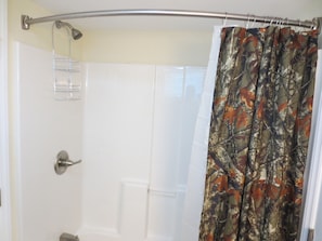 Combined shower/tub, hair dryer, towels, soap