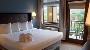 Suíte, 1 cama King e sofá-cama (King Premier Suite) | Cofres nos quartos, ferros/tábuas de passar roupa, Wi-Fi de cortesia