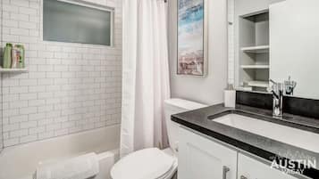 Eco-friendly toiletries, hair dryer, towels, soap
