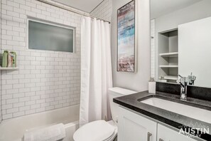Eco-friendly toiletries, hair dryer, towels, soap