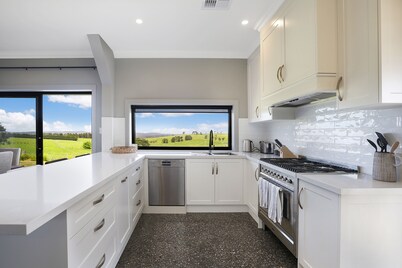 Impresionante Homestead en 100 acres, en las tierras altas del sur.