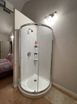 Shower, hair dryer, towels, soap