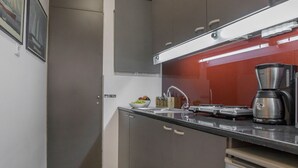 Studio | Cuisine privée | Cafetière-théière, réfrigérateur, four à micro-ondes, surface de cuisson