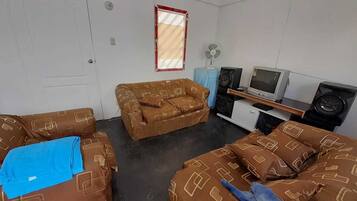 Traditional House, 2 Bedrooms | Living room | Flat-screen TV
