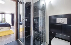 Shower, bidet, towels, soap