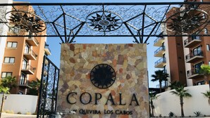 A stone wall with the text "COPALA" and "Quivira Los Cabos" indicating a hotel or resort location. - Cabo Private 3bed,3bath Condo + Fober Optic WiFi, Spacious Condo at Quivira Golf (Cabo San Lucas)