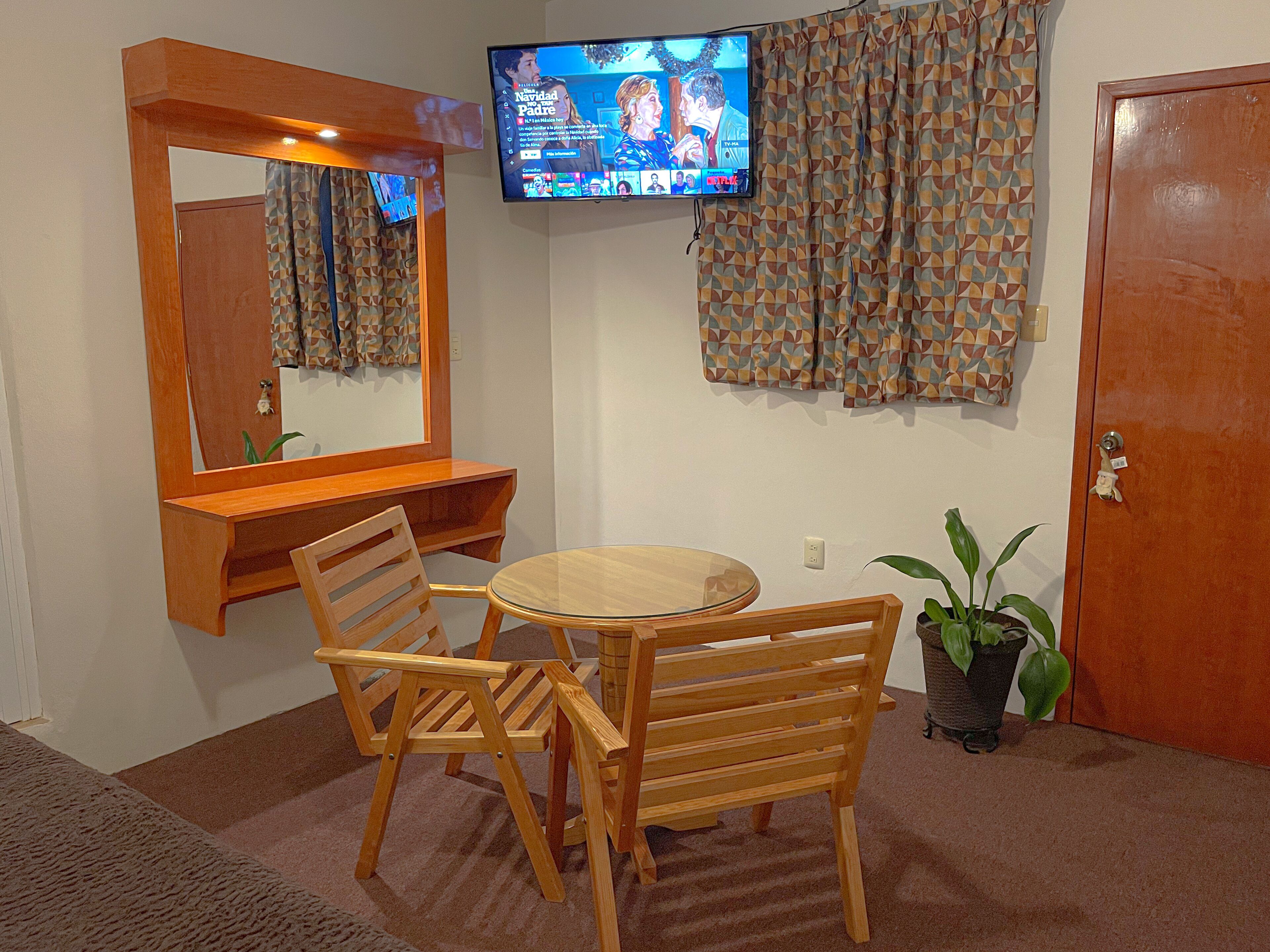 Suite estudio Confort | Sala de estar