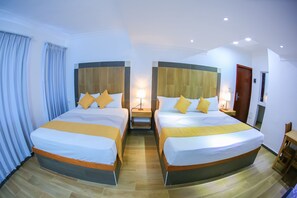 Family Quadruple Room | Egyptian cotton sheets, premium bedding, down comforters, in-room safe - Hotel Vicentina (Boca Chica)