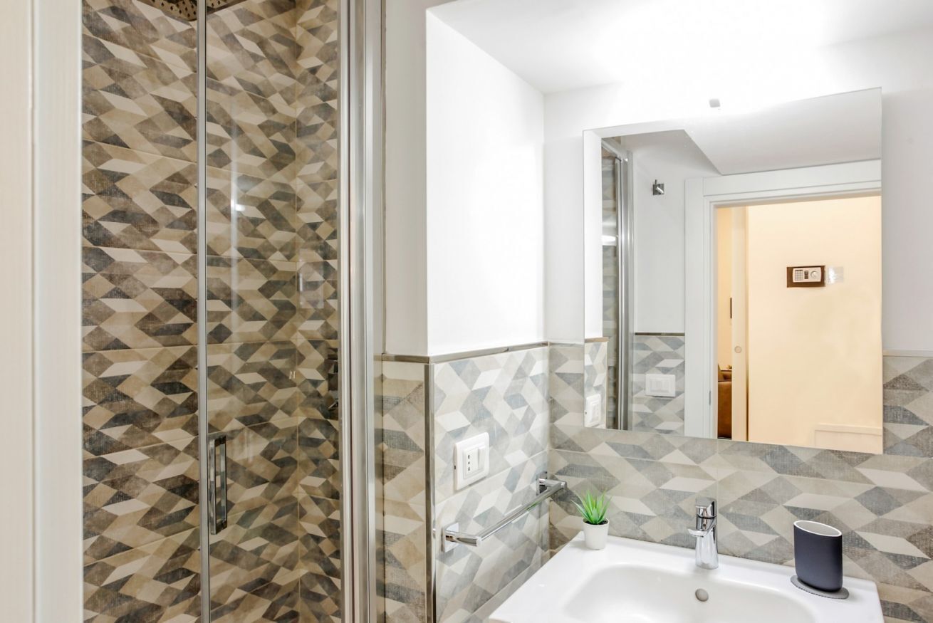 Shower, hair dryer, bidet, toilet paper