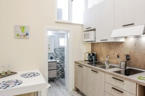 Microwave, stovetop, coffee/tea maker, electric kettle