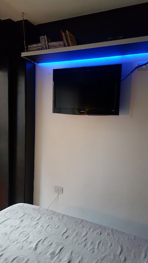 1 habitación, tabla de planchar con plancha, wifi y ropa de cama 