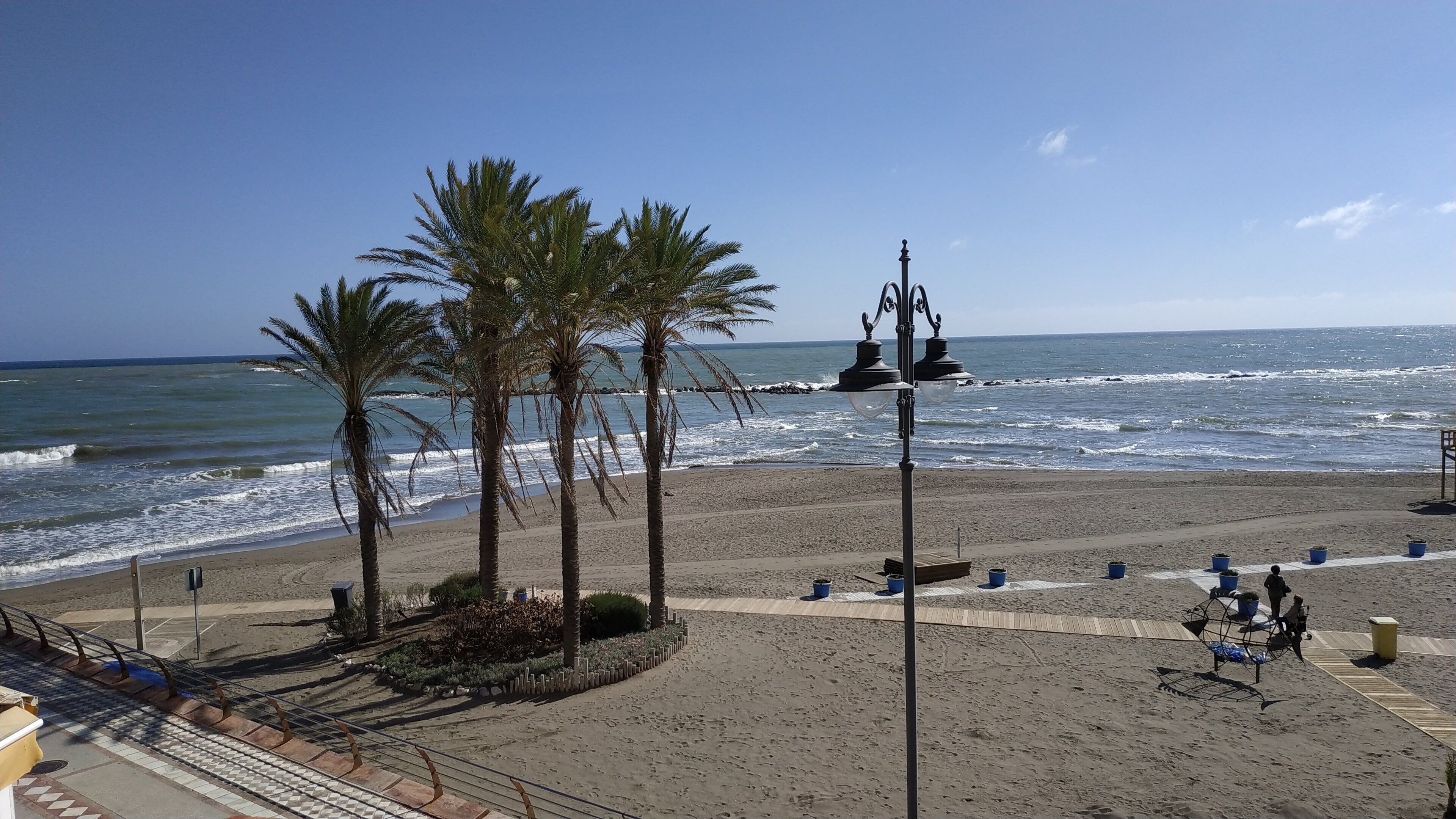 On the beach, sun loungers