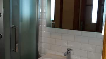 Shower, towels, toilet paper