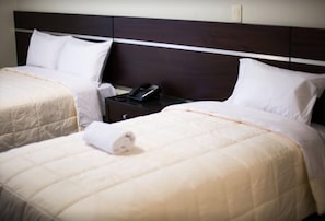 Twin Room | Iron/ironing board, bed sheets, wheelchair access