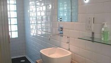 Shower, shampoo, toilet paper