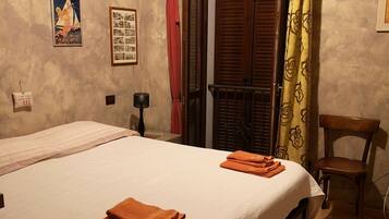 1 chambre, fer et planche Ă repasser, draps fournis