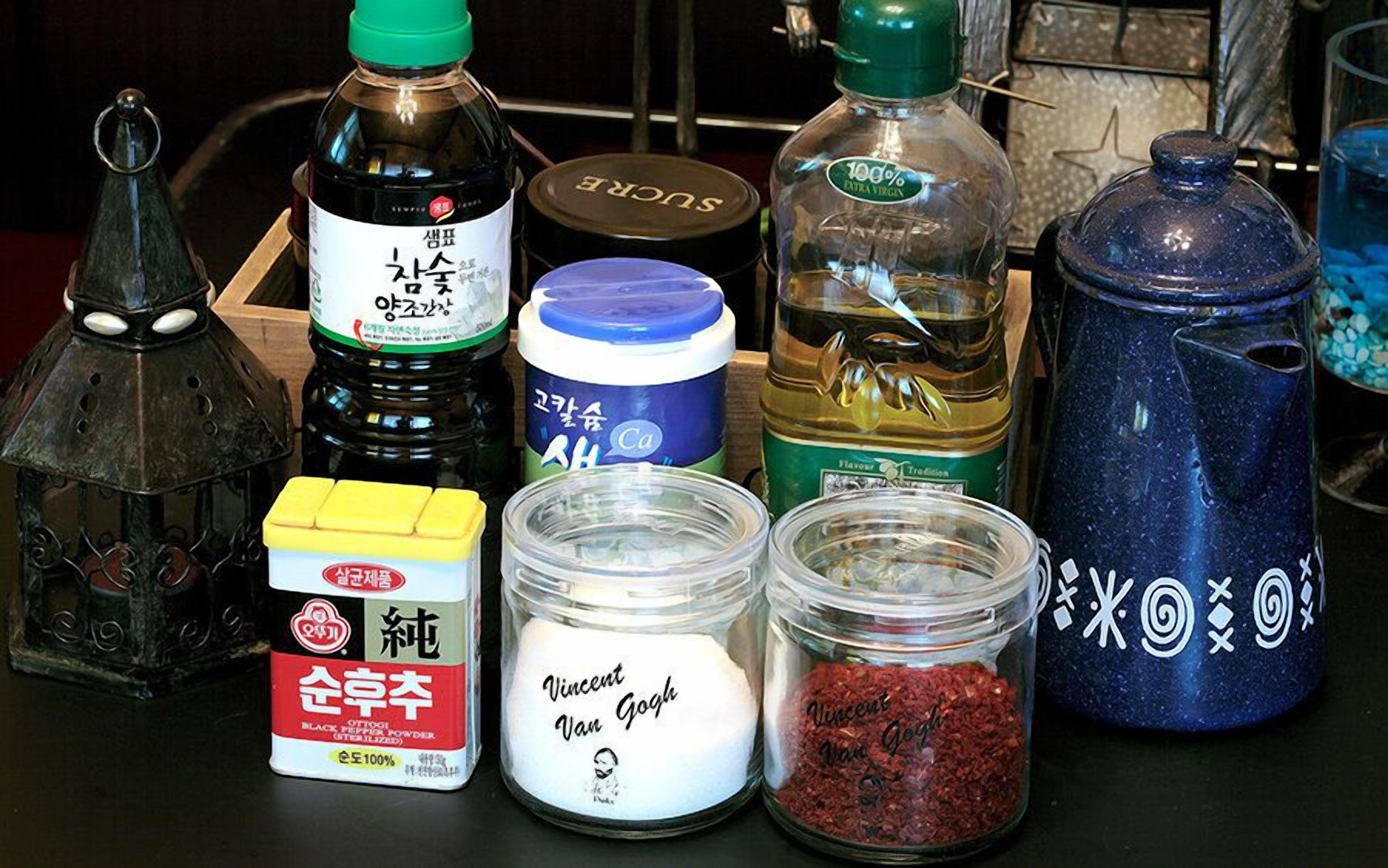 Various kitchen items including bottles, jars, and containers.