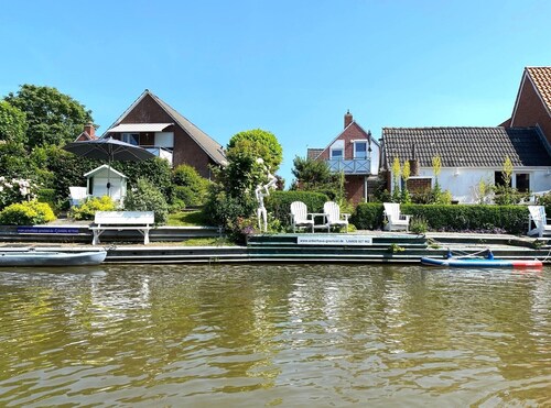 Élégant appartement au premier étage avec une vue magnifique sur la rivière