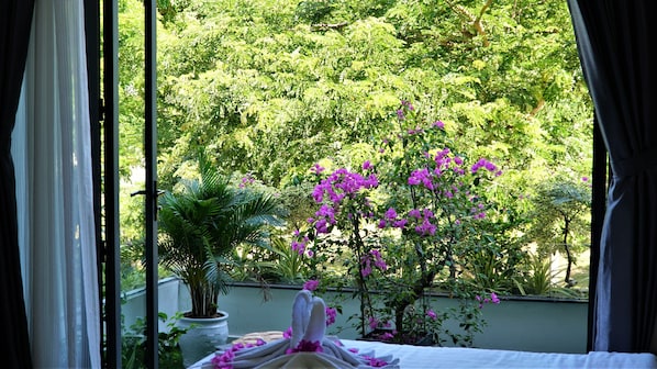 Habitación cuádruple familiar | Jardín