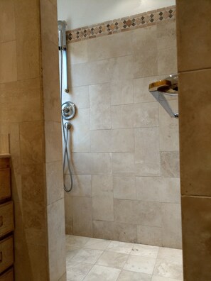 Shower, hair dryer, towels, soap