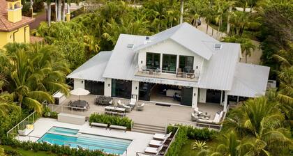 4BR Luxury Beachfront Retreat with Designer Finishes & Panoramic Gulf Views