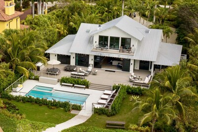 4BR Luxury Beachfront Retreat with Designer Finishes & Panoramic Gulf Views