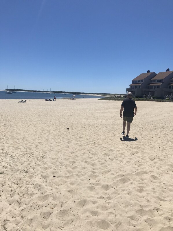On the beach, sun-loungers