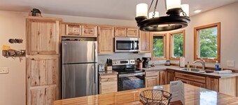 Newly remodeled lake home w/panoramic views & private swimming area