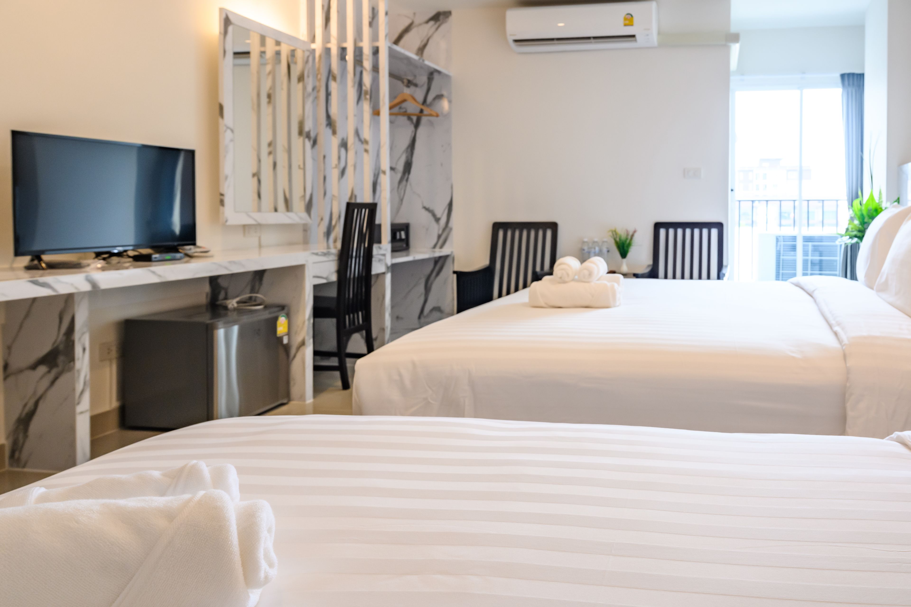 superior triple room | premium bedding, in-room safe, individually decorated, desk