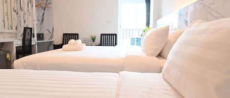 Superior Triple Room | Premium bedding, in-room safe, individually decorated, desk