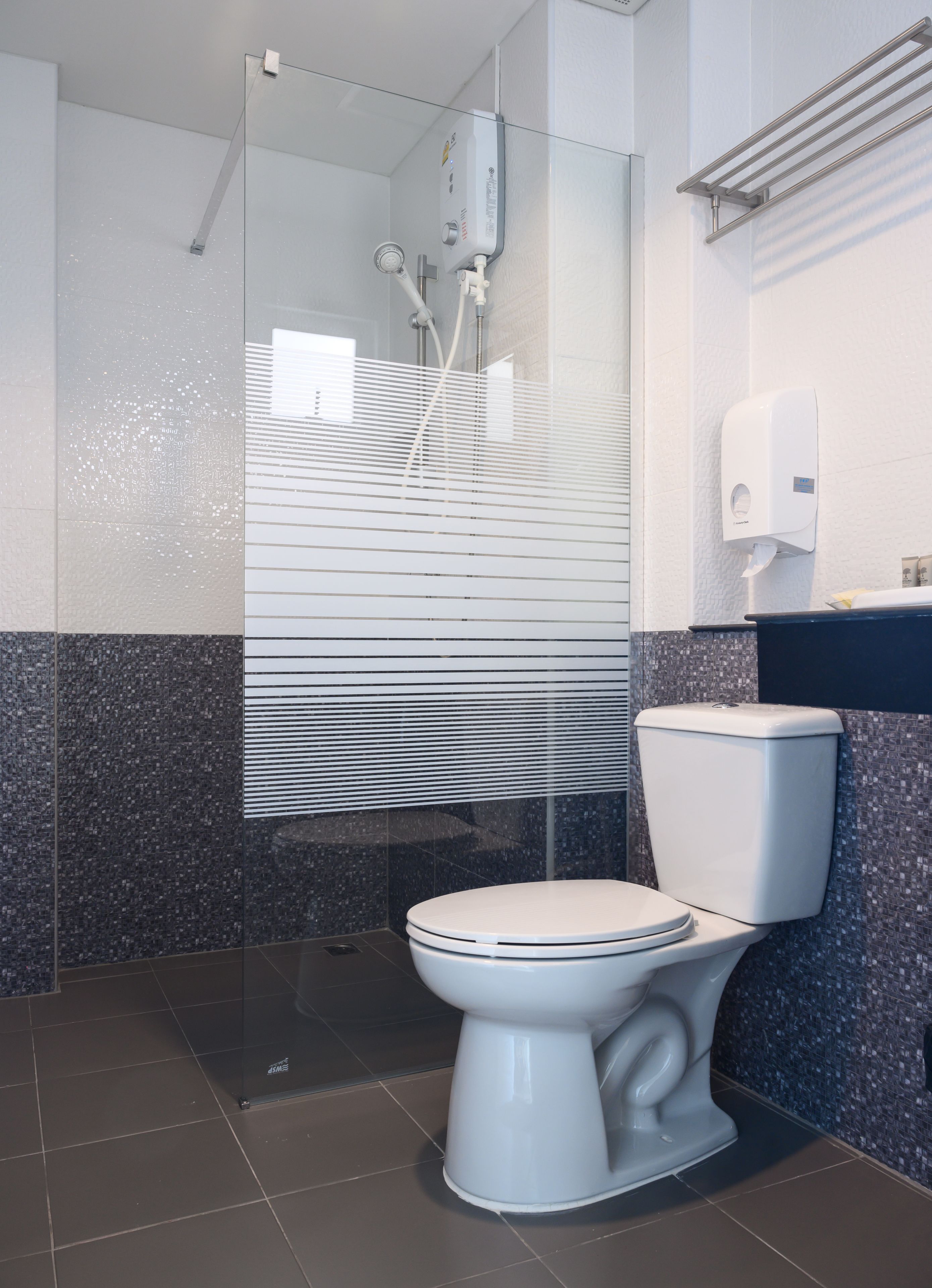 superior triple room | bathroom | shower, hair dryer, towels, soap