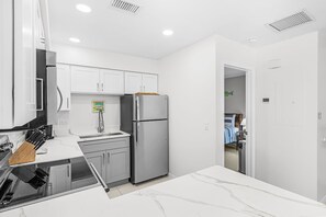 Coffee/tea maker, fridge, microwave, toaster