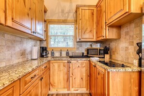 Fridge, microwave, oven, stovetop - Lake Travis Waterfront with Resort Style Pool and Million Dollar Views. (Marble Falls)