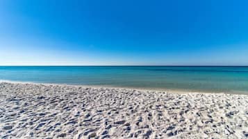 On the beach, sun-loungers, beach towels