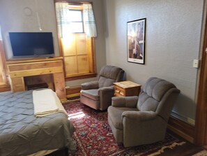 1 habitación, tabla de planchar con plancha, wifi gratis y ropa de cama 