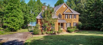 Lakefront home with boat dock, private firepit & game room - dog-friendly