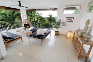 Family Villa, 4 Bedrooms | Living area | 43-inch Smart TV with cable channels