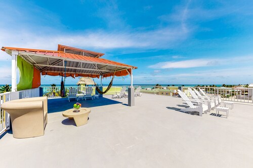 Family-friendly condo with WiFi & partial AC, located just steps from the ocean